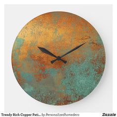 a clock that is on the side of a wall with rusted paint and black hands