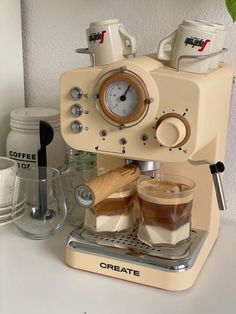 an espresso machine sitting on top of a counter