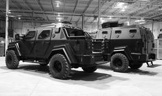 an armored vehicle is parked in a warehouse