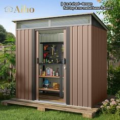 an outdoor storage shed with the door open and shelves full of tools in it on grass