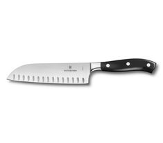 a large knife with black handles on a white background