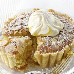 a plate topped with a cake covered in powdered sugar