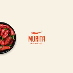 red peppers in a black bowl with the word murita written below it on a white background