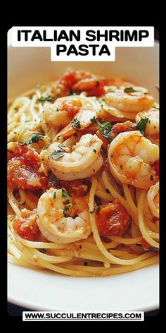 a white plate topped with pasta and shrimp