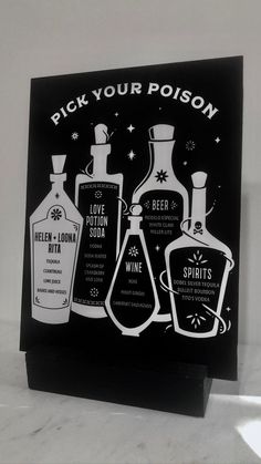 black and white greeting card with three bottles of alcohol on it, which says pick your poison