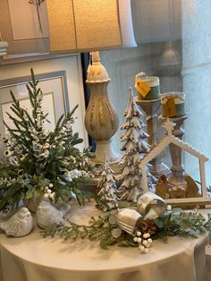 a table with christmas decorations on it