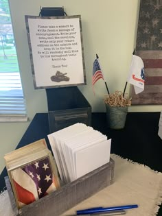 a desk with an american flag and some pictures