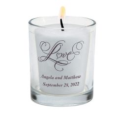 a candle with the word love on it