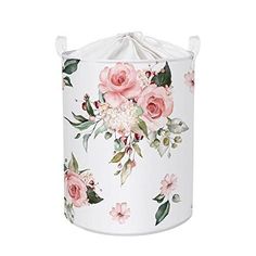 a white and pink flower covered trash can