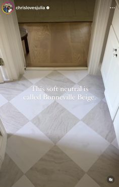 a white and black checkered floor with a quote written on the bottom right corner