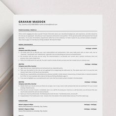 a professional resume is shown on top of a white sheet with the title's name and