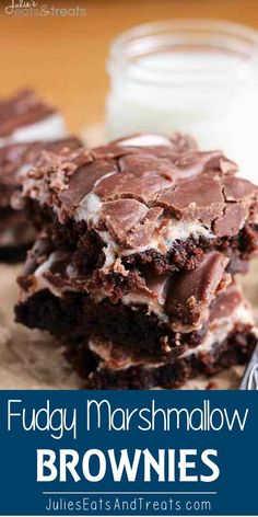 chocolate fudge marshmallow brownies stacked on top of each other