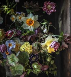 a bunch of flowers that are in a vase