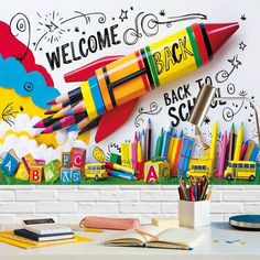 there is a colorful wall mural with crayons and pencils on it that says welcome back to school