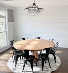 Pictured is a 72 W Rustic Alder table is a Natural Finish. Pictured is 8 Metal Chairs is a Black Finish.