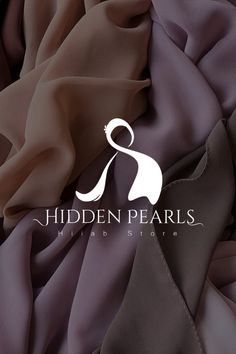 the hidden pearls logo is shown on top of an unbuttoned purple fabric