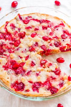 a cherry pie with one slice cut out and the rest on top of the pie