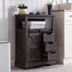 PRICES MAY VARY. [CUSTOMIZED STORAGE SPACE] 23.5"L × 12"W × 32"H, Utilize the tabletop to store cleaning supplies of any height, open shelf and three storage drawers for small items. Also sliding barn door and adjustable shelf to suit your storage needs, creating an orderly life space without mess not only in bathroom [FARMHOUSE RUSTIC STYLE] Crafted from high-quality engineered wood, our storage cabinet is designed with classic barn door, double cross pattern and weathered finish that gives a charming rustic feel. Redecorate the whole space with elegant metal decorations to add more deeper farmhouse touch for it [STURDY SUPPORT] Comes with one sturdy support base and tipping restraint hardware, so you could fix this small cabinet to the wall and prevent it from wobbling or tipping over. A Small Western Home Decor, Barn Door Storage, Storing Cleaning Supplies, Cabinet For Bathroom, Farmhouse Storage Cabinets, Bathroom Floor Storage Cabinet, Bathroom Floor Cabinet, Small Storage Cabinet, Bathroom Floor Storage