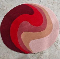 Bring an artistic touch to your space with this striking round rug. Featuring a dynamic swirl design, the rug showcases a blend of rich red, maroon, pink, and beige tones, creating a warm and inviting aesthetic. Its abstract design adds a modern and stylish vibe to any room. Ideal Placement: Living Room: Perfect for creating a bold centerpiece in your seating area. Bedroom: A cozy addition near the bed or under a vanity. Study or Lounge Area: Adds warmth and a contemporary feel. Creative Spaces: Ideal for a home studio or office to inspire creativity. Material & Care: Made with soft and durable material for comfort and longevity. Easy to maintain with regular vacuuming and spot cleaning. Available sizes:  4X6 5X8 6X9 8X10 9X12 10X14 Ft Antique Rug for Living Room, Kids room. Specializing i Swirl Rug, Bold Centerpieces, Red And Beige, Beige Tones, Lounge Area, Creative Spaces, Room Kids, Modern Round, Red Maroon