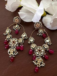 This pair of earrings has its own quirky charm. These earrings come as a perfect accessory to elevate your look from drab to delightful. One word that perfectly describes these earrings is royal. These earrings get their sophisticated look from the intricate design-work done on them. Each pattern is flawless and is the result of the meticulous attention to details craftsmen. 100% Satisfaction Guarantee: Long Lasting Plating, High-Quality Stones, Highest quality and craftsmanship. Gifting: This p Single Chandbali Earring For Festive Occasions, Festive Chandbali Single Earring, Diamond Earrings Wedding, Earring Indian, Sabyasachi Jewelry, Pakistani Earrings, Sabyasachi Jewellery, Indian Nose Ring, Traditional Earrings