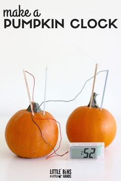 two oranges with wires attached to them and the words make a pumpkin clock