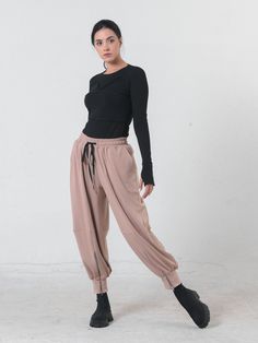 Winter Harem Pants - METP0100 We are happy to present you with those awesome and extravagant pants! Inspired by street style and oversize fashion, those drop crotch pants are a wonderful mixture of quality materials, modern elements and extravaganza. The main accent on them are the front zippers. Along with them, we have added two side pockets. The waist is elastic and has drawstrings and the length is 7/8. Their length is about 91 cm/ 35.8 inch Wear those aladdin pants to your next event or a c Ninja Pants, Japanese Pants, Samurai Pants, Casual Meeting, Drop Crotch Pants, Pants Elastic Waist, Modern Elements, Oversize Fashion, Elastic Waist Pants