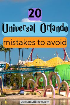 an amusement park with the words universal orlando written on it and in front of them