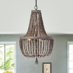 Turn your home into a farmhouse sanctuary with this charming three-light empire chandelier. Natural tones combine with wooden beads to create this distinguished fixture. Three candelabra lights emit a subtle glow to create a peaceful atmosphere. Chandelier Over Bathtub, Chandelier Natural, Empire Chandelier, 3 Light Chandelier, Beaded Chandelier, Outdoor Ceiling Fans, Lamp Sets, Dining Room Lighting, Natural Tones