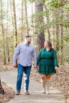 Couple taking engagement photos in the fall. Woman is curvy and wearing knee high boots and a green dress Engagement Photo Ideas Plus Size, Engagement Picture Outfits Plus Size, Engagement Shoot Plus Size, Engagement Photo Plus Size, Fall Engagement Photos Plus Size, Spring Engagement Photos Outfits Plus Size, Plus Size Poses For Pictures Couples, Engagement Photos Plus Size Couple