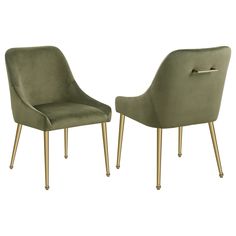 a pair of green chairs with gold legs