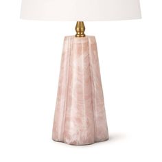 a pink marble lamp with a white shade