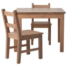 a wooden table and two chairs with one chair up against the other, in front of a white background