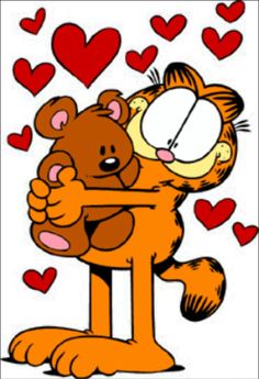 garfield the cat hugging a teddy bear with hearts