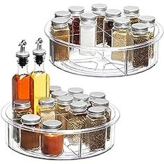 two clear spice racks holding spices and condiments