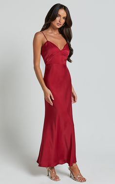 Get ready to turn heads in the Jovana Midi Dress. This stunning formal dress features a sweetheart neckline and bust panel detail, creating a figure-flattering silhouette that is sure to make you feel like the queen you are. Made from luxurious satin fabric, this midi dress oozes elegance and sophistication. The sleeveless design adds an extra touch of femininity, making it perfect for any special occasion. Whether you're attending a wedding or hitting the dance floor at a fancy event, this wine Graduation Dresses Red, Red Maid Of Honor Dress, Red Satin Bridesmaid Dresses, Fancy Dresses Classy, Silky Red Dress, Red Wedding Guest Dress, Formal Dresses Midi, Red Wedding Guest Dresses, Formal Dress Midi