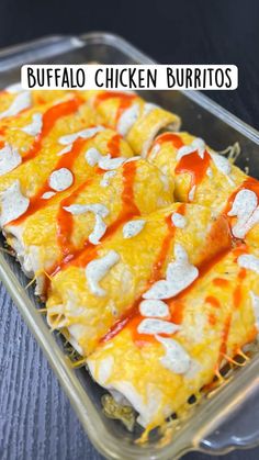 an enchilada dish with cheese and sauce in a plastic container on a table