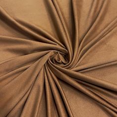 a close up view of a tan fabric