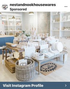 an image of a store display with dishes on the table and other items in baskets