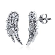 PRICES MAY VARY. 【METAL】 These angel wings stud earrings are crafted with fine real solid sterling silver, stamped 925, plated with rhodium to enhance shine and durability. 【STONE】 Set with 0.19 ct.tw round cubic zirconia CZ (1mm) in pave setting. Berricle Zirconia is created in a way that truly replicates the cut, clarity and sparkle of a diamond. 【MEASUREMENTS��】Earring measures 0.67"(L), 0.3"(W). Posts with butterfly backs. These angel wings stud earrings flutter with divine brilliance for an e Silver Angel Wings, Cubic Zirconia Jewelry, Cz Stud Earrings, Pave Setting, Stunning Jewellery, Silver Earrings Studs, Angel Wings, Jewelry Earrings Studs, Post Earrings