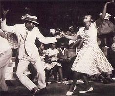 black and white photograph of two people dancing