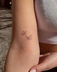 Tattoo studio Life Line Butterflies Small Tattoo, Subtle Tattoos For Couples, Dainty Butterfly Tattoo Wrist, Cute Butterflies Tattoos, Friendship Tattoo Butterfly, Very Small Butterfly Tattoo, Two Tiny Butterfly Tattoo, Butterfly Arms Tattoos, Single Needle Tattoo Butterfly