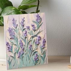 a painting of purple flowers on a pink background art board print by artist and photographer person