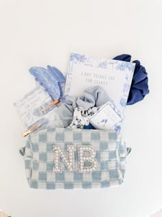 a blue and white checkered bag with personal items