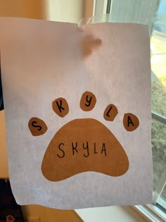 an animal paw with the word skyla written on it