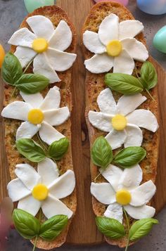 two slices of bread with flowers and leaves on them