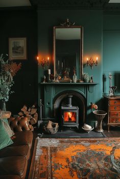 a living room filled with furniture and a fire place in front of a mirror on the wall