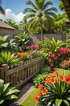 the garden is full of tropical plants and flowers