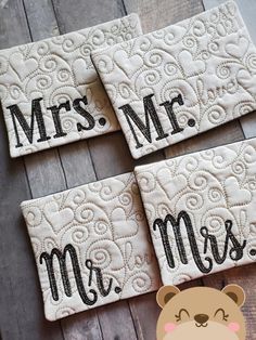 three coasters with the words mr and mrs on them next to a teddy bear