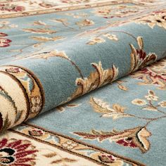 This collection features machine made rugs at their finest. It brings the finest designs of the oriental weaving tradition together with warm, modern red, green, and blue jewel tones are accented by neutral tones of ivory and beige. The thick heat set polypropylene pile is a plush 0.5" that is soft, stain resistant, and doesn't shed or fade over time. The 100% jute backing is safe for wood floors and all four sides of the rug are serged for improved durability. A wide range of shapes, sizes, and Jewel Tone Colors, Solid Area Rugs, Target Rug, Light Blue Area Rug, Well Woven, Traditional Modern, Round Area Rugs, Stain Resistant Fabric, Traditional Area Rugs