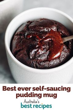 a white bowl filled with pudding on top of a table